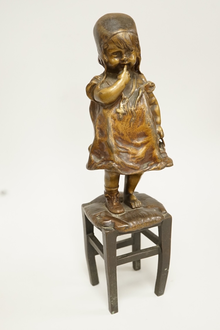 Juan Clara, a figure of a girl on a stool, 21.5cm high